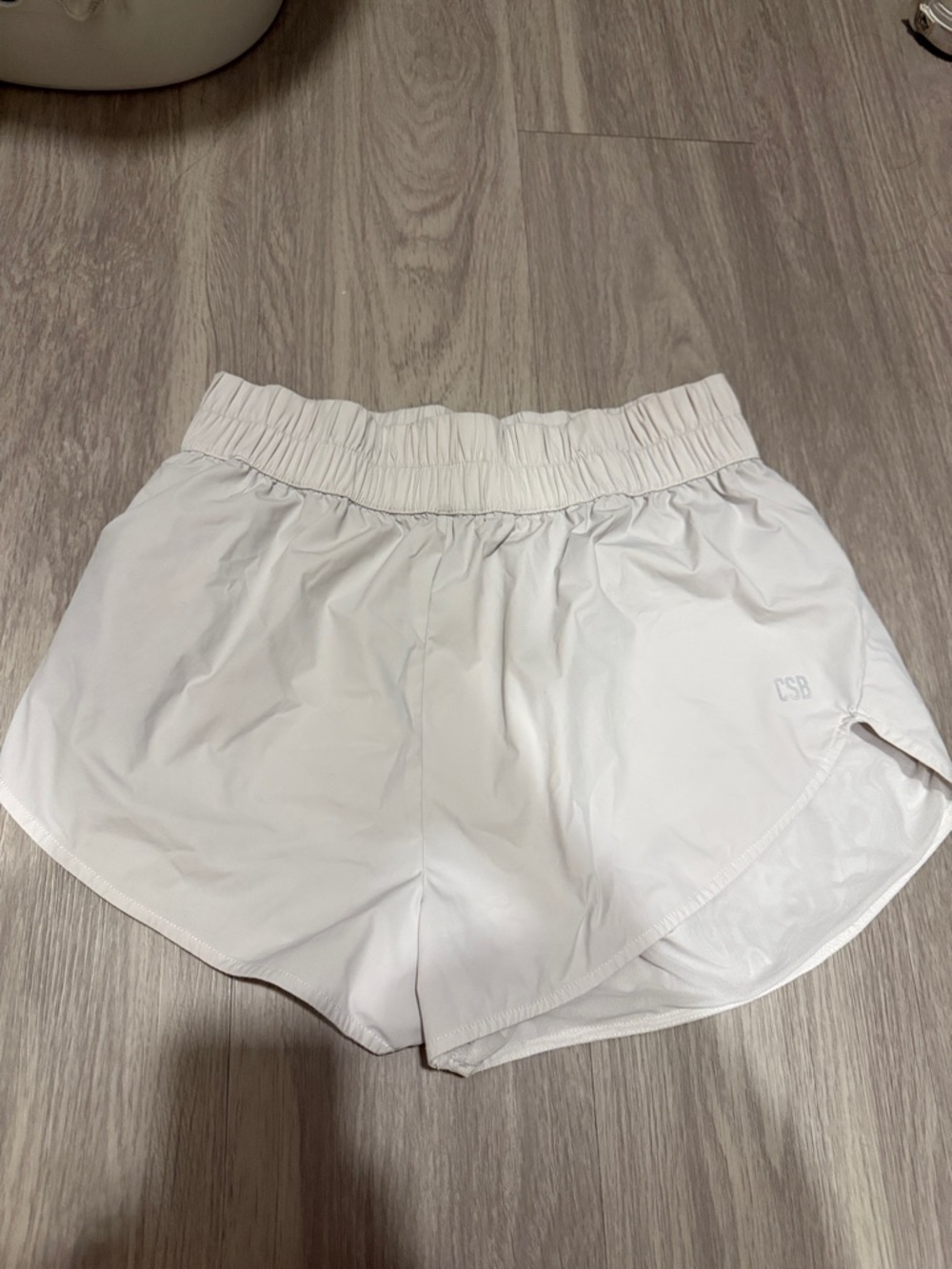 CSB white run shorts